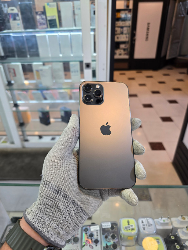 گوشی موبایل اپل آیفون 12 پرو مکس 256 گیگ ZAA دو سیمکارت | مشکی | کارکرده | باتری 81% | باز نشده | بدنه تمیز