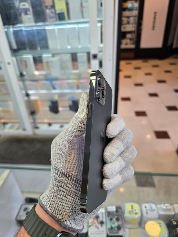 گوشی موبایل اپل آیفون 12 پرو مکس 256 گیگ ZAA دو سیمکارت | مشکی | کارکرده | باتری 81% | باز نشده | بدنه تمیز